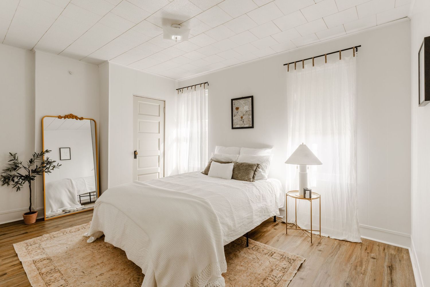 White Bedroom with Natural light coming through the windows