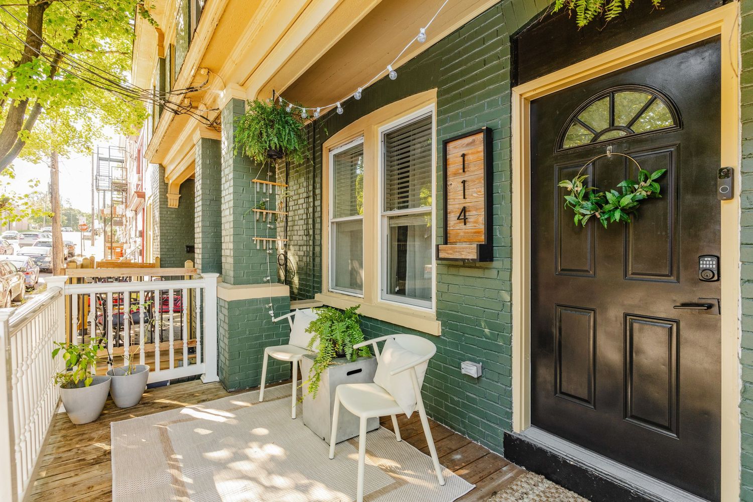 Green Brick Front Porch in Lancaster PA. Photo Taken by Nicole + James Co. Real Estate Photographer in Lancaster PA.