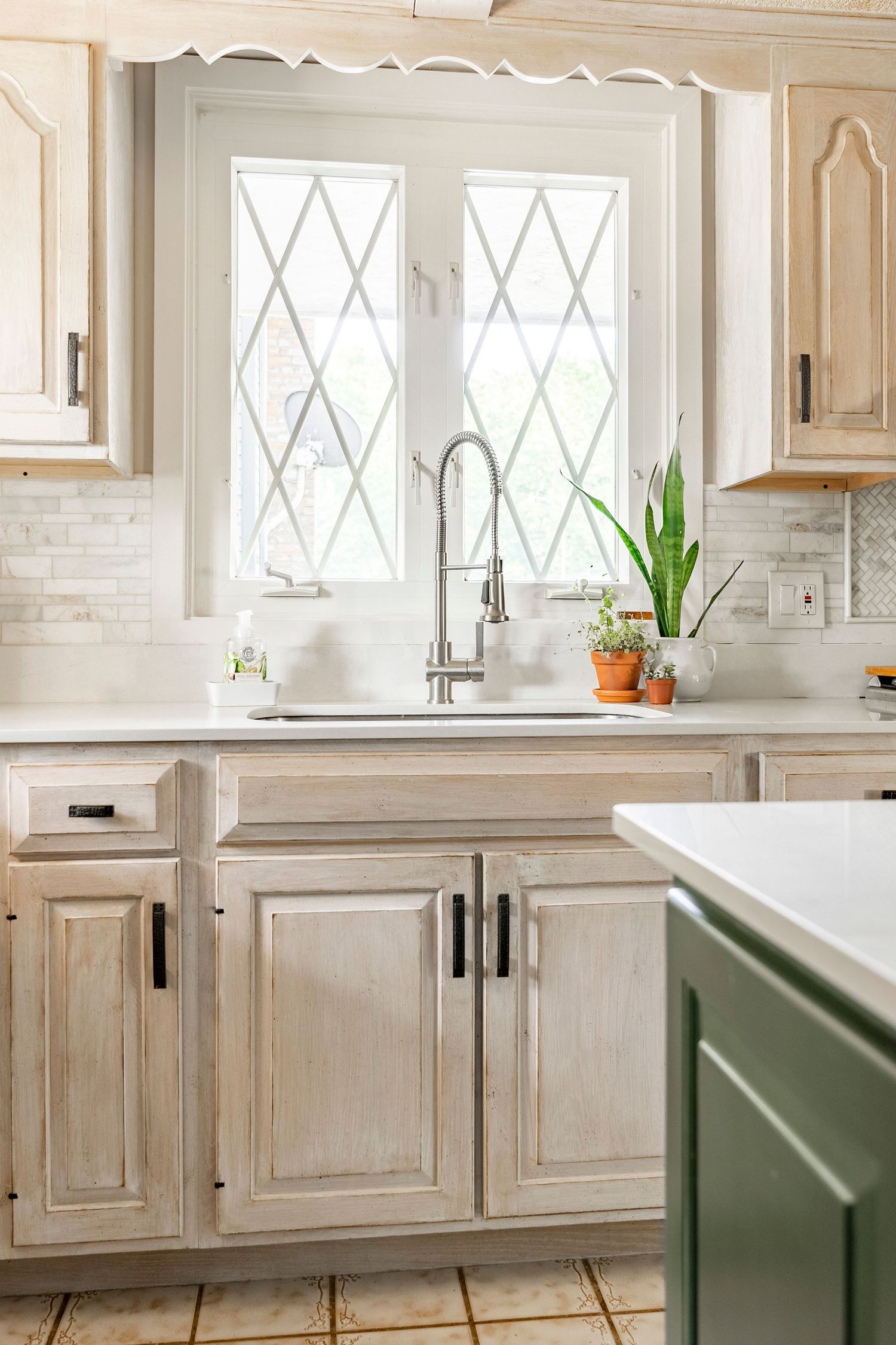 Kitchen Faucet with light coming through window