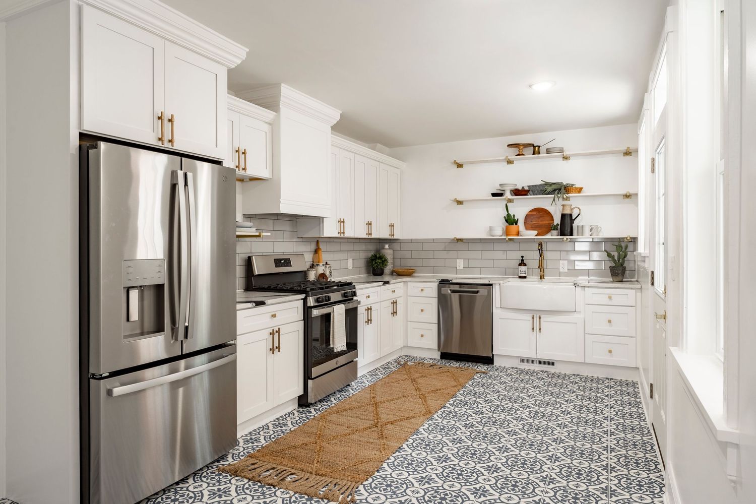White kitchen with stainless steel appliances. Call now for real estate photography in Lancaster, PA.