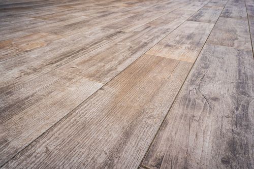 Close-up texture of wood-look composite deck board flooring