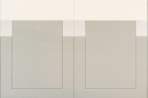 Close-up of paired gray panel inserts framed by cream trim