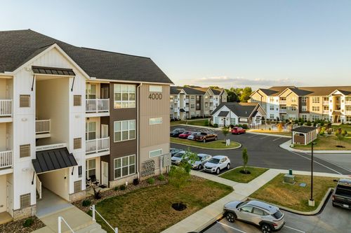 Aerial view of building 4000 and its courtyard among neighboring apartment buildings
